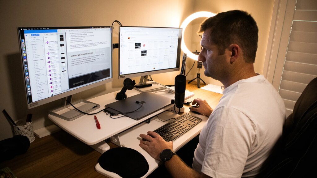 contact andrew redding - on his computer group coaching